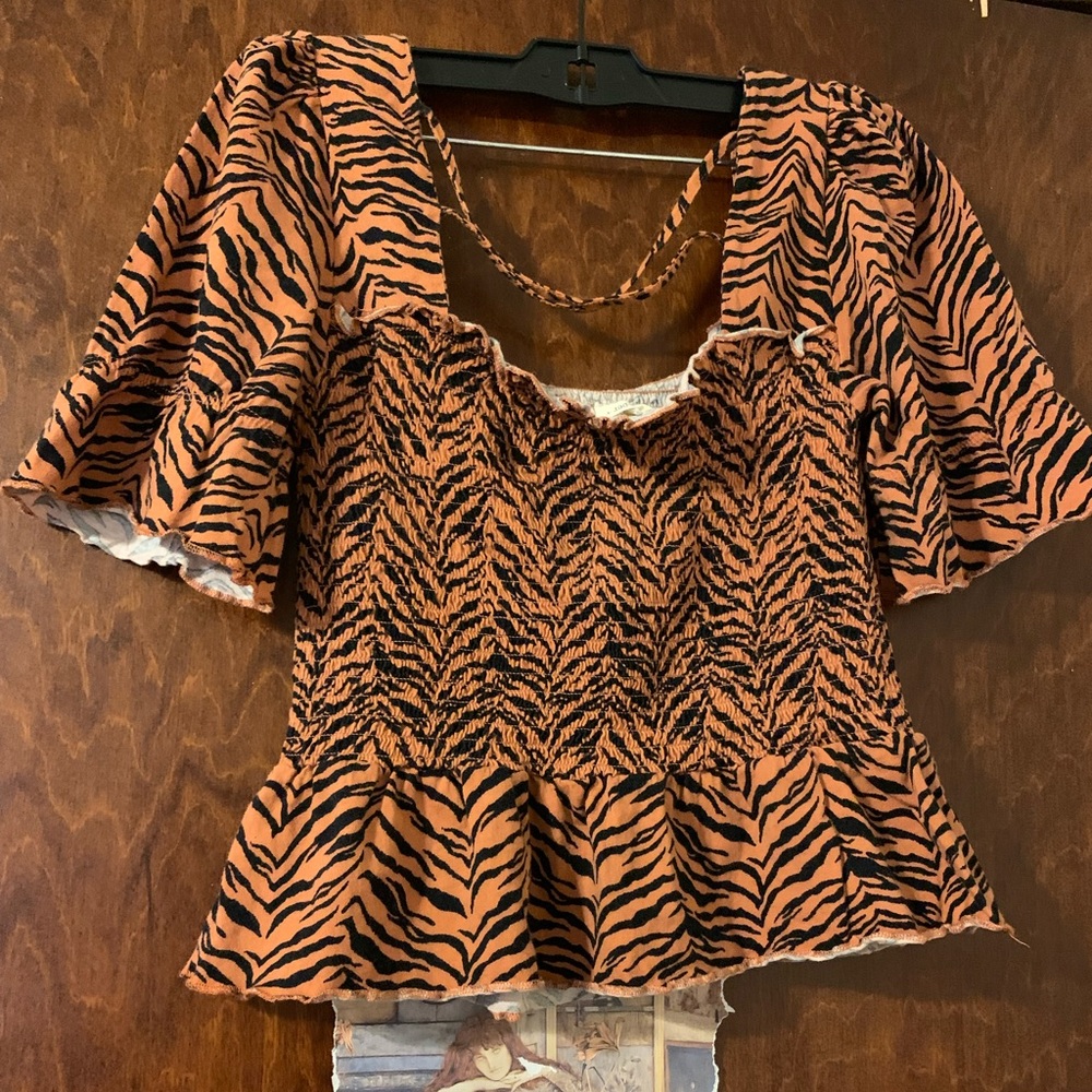 Tiger Print Peplum Puff Sleeve Top